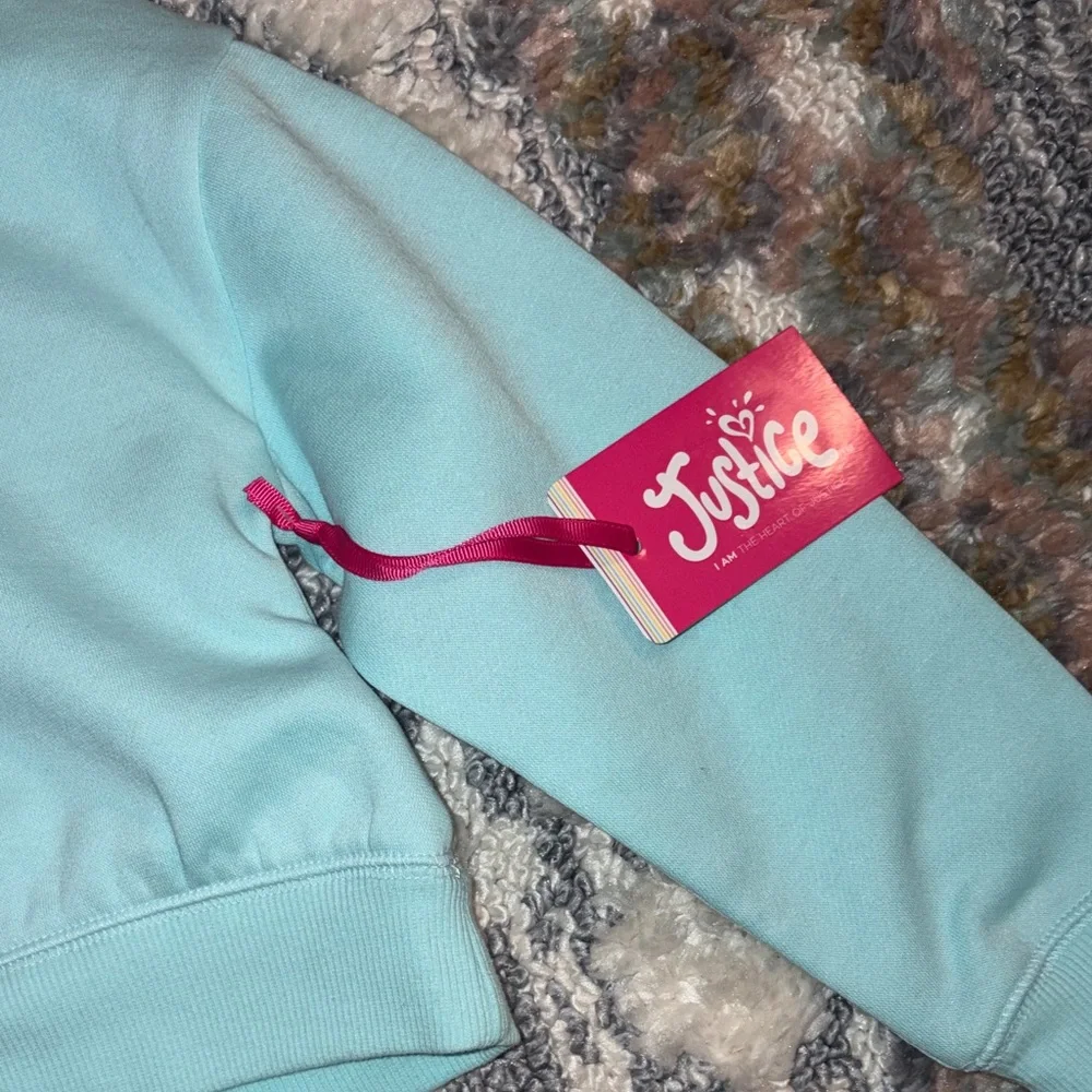 Justice Light Blue Smiley Face Hoodie